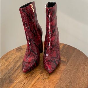 Snake print high top heels